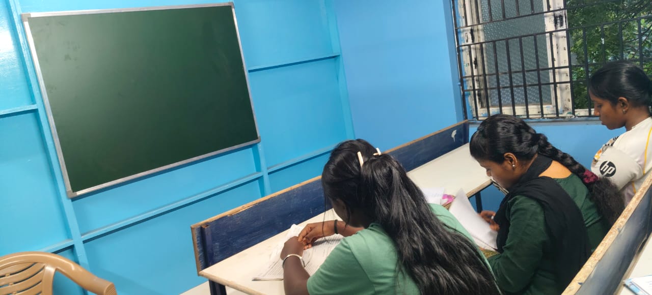 Girls studying at JP Goodwill